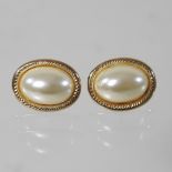 A pair of 9 carat gold pearl stud earrings