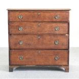 A George III oak chest of drawers,