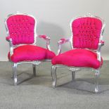 A pair of modern pink upholstered show frame armchairs