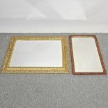 An early 20th century walnut and gilt framed wall mirror, 71 x 45cm,