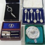 A set of six early 20th century coffee spoons, cased,