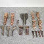 A collection of various antique carved wooden corbels,