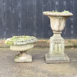 A reconstituted stone planter, on a plinth base, 86cm high,