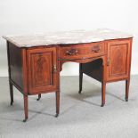 An Edwardian mahogany and inlaid marble top sideboard, by Maple & Co,