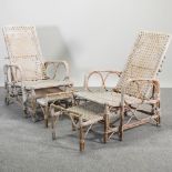 A pair of 1930's continental reclining wicker chairs,