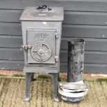 A Jotul cast iron wood burning stove,