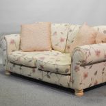 A modern floral upholstered sofa,