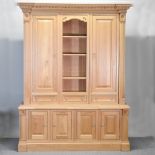 A Clive Christian light oak side cabinet, of large proportions, with a dentil moulded cornice,