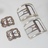 A pair of George III silver shoe buckles, each of curved reeded shape, with a steel fastener,