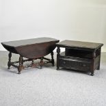 An Ercol dark elm occasional table, together with an Ercol gateleg table,