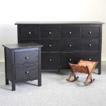 A black ash effect bedstead, with a slatted wooden base and drawers below, 148cm,