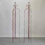 A pair of metal folding garden spires,