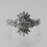 A 9 carat gold baguette cut diamond cluster ring,