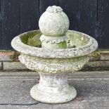 A reconstituted stone garden fountain,