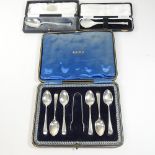 A set of six silver teaspoons, cased, together with two cased silver presentation spoons,