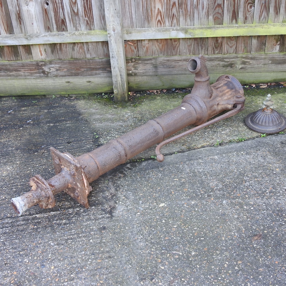 A large cast iron garden pump,