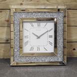 A modern mirrored clock,