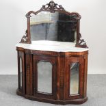 A Victorian mirror back walnut and inlaid serpentine chiffonier, with a marble top,