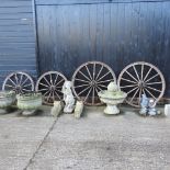A set of four early 20th century wooden cart wheels,