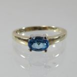 A 9 carat gold topaz ring,