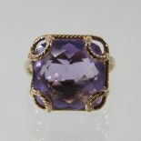 A large 9 carat gold amethyst ring,
