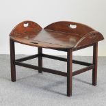A 20th century mahogany butler's tray, on stand,