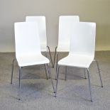 A set of four 1960's style white painted wooden stacking chairs,
