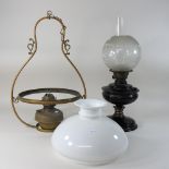 A Victorian oil lamp, together with a hanging lantern,