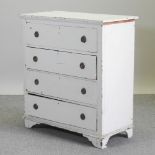 A white painted chest of drawers,