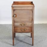 A George III mahogany bedside cabinet,