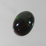 An unmounted black opal, approximately 2.