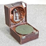 A vintage Decca patent portable record player, RD631877, in a travelling case, with internal horn,
