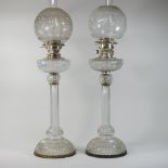 An impressive pair of 19th century silver plated and cut glass oil lamps,