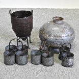 A metal urn on stand, together with three spice carriers and a round water pot,
