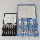 A set of silver coffee spoons, cased,