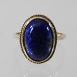 A 9 carat gold lapis lazuli cabochon ring, by Aspreys,