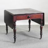 A Victorian mahogany drop leaf dining table, with a single drawer,