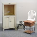 A cream painted side cabinet, 67cm, together with a cream painted spindle back chair,