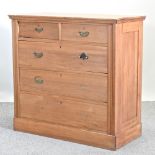 An Edwardian satin walnut chest of drawers,