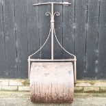 A cast iron garden roller,