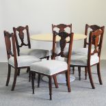 A set of six Edwardian inlaid dining chairs,