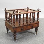 A Victorian walnut canterbury,