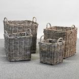 A set of four graduated square log baskets,