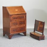 A Regency style mahogany and satinwood inlaid bureau, 61cm,