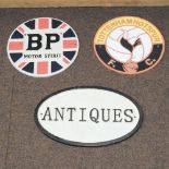 A reproduction BP metal advertising sign, together with an antique sign, 35cm,