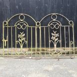 A pair of wrought iron garden gates,