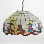 A large Tiffany style light shade,