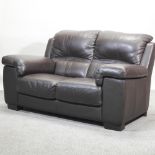 A modern brown leather upholstered sofa, 170cm, together with another,