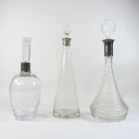 A ribbed glass decanter and stopper, with a silver collar, by Mappin & Webb, Birmingham 2002,