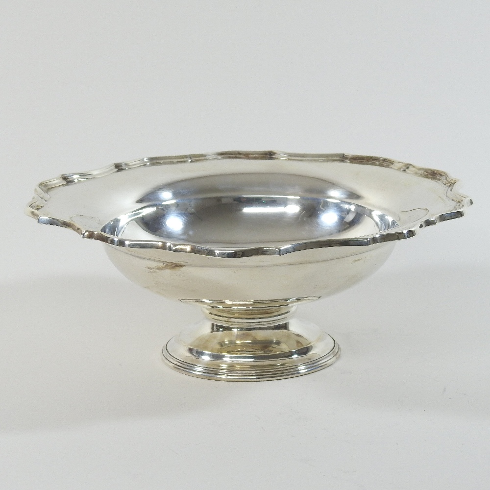 An early 20th century silver pedestal bowl, of circular shape, with an undulating rim, Chester 1922,